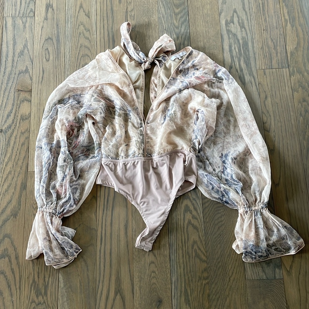 Super cute low neck flowy bodysuit